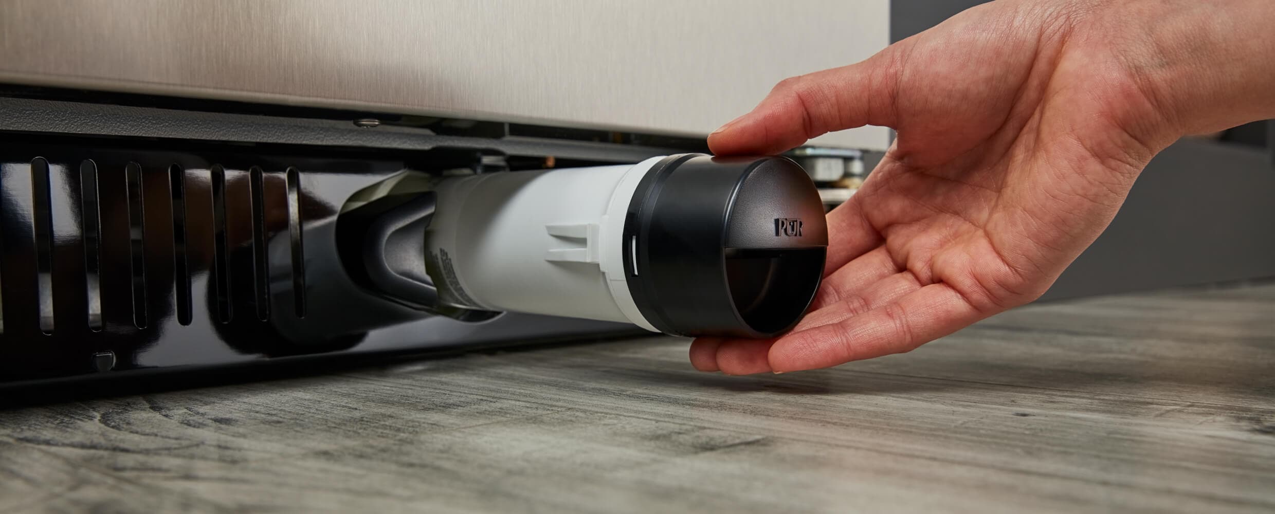 Removing water filter from the 42" KitchenAid® Built-In Side-by-Side Refrigerator